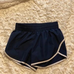 Navy blue and white running shorts